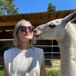 a special llama kiss for visitors to The Llama Sanctuary